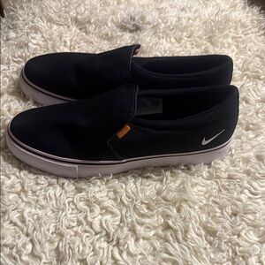 Nike Black Slip-On Sneakers with White Swoosh and Pink Trim